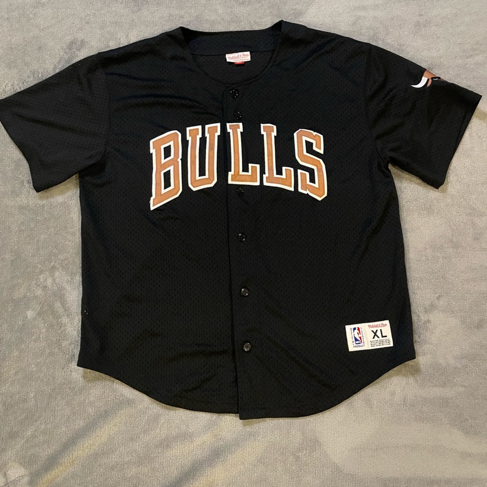 Black and bronze Chicago bulls baseball jersey. Mitchell and ness